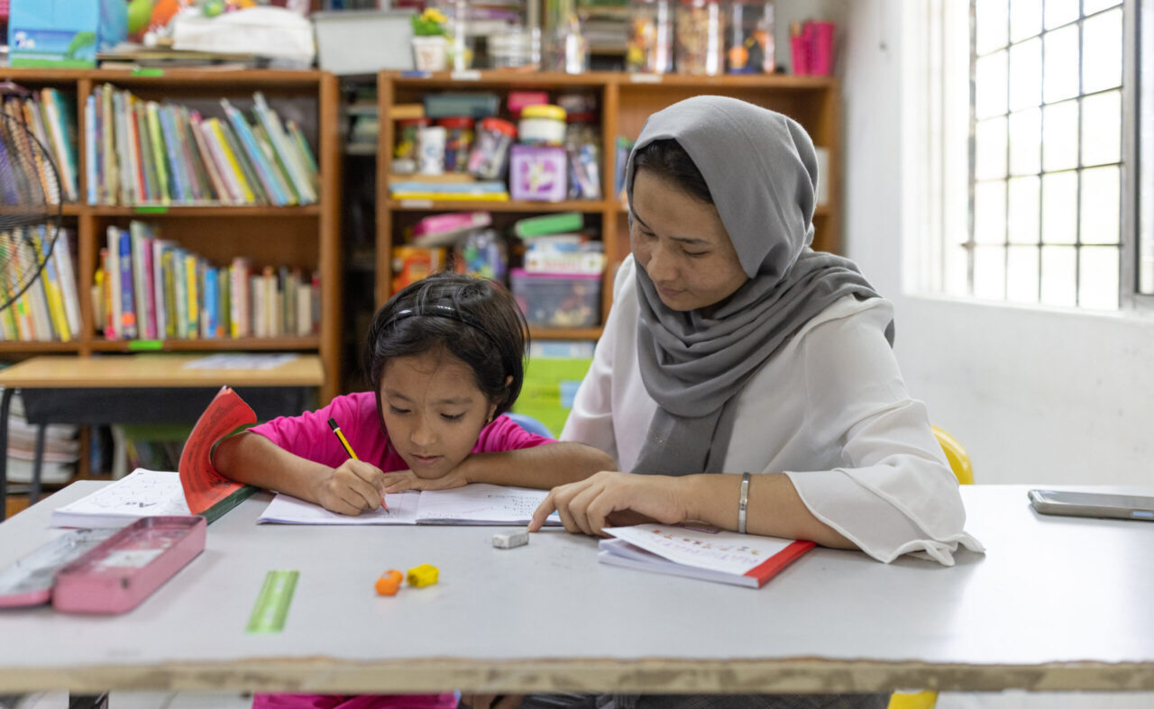 Greater Action Woman and Child Studying